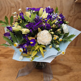 Bouquet of purple and white flowers.