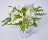 white lisianthus and foliage corsage on a silver band