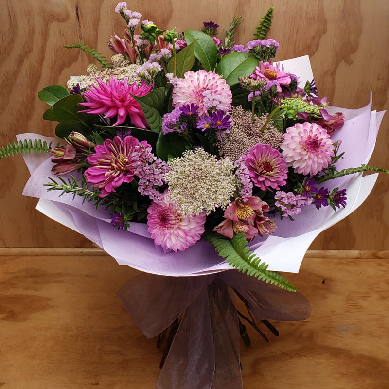 Florist Choice: Purple, Mauve and Pink toned Bouquet or Waterbox