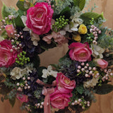Fabric flower and foliage wreath