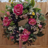 Fabric flower and foliage wreath