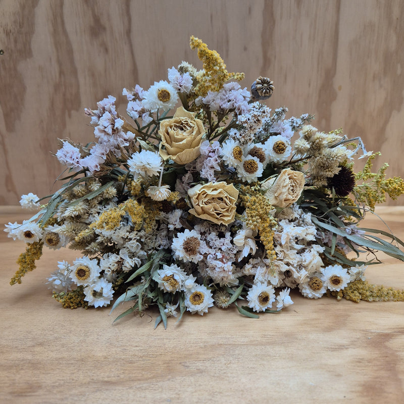Bouquet of dried cream and lemon  flowers.