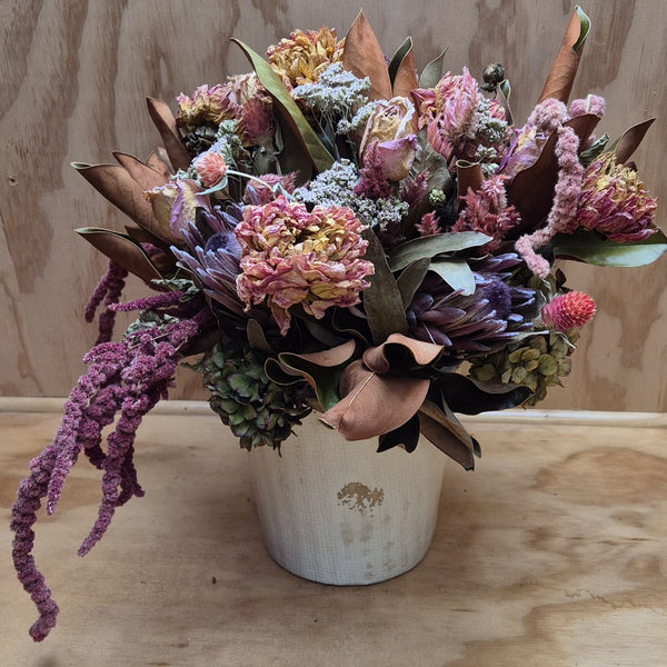 Nyrah- arrangement of dried flowers in a pot.