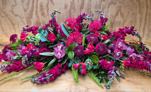 Red Toned Casket Spray
