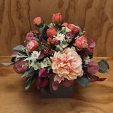 Peachy faux flower arrangement