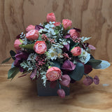 Peachy faux flower arrangement