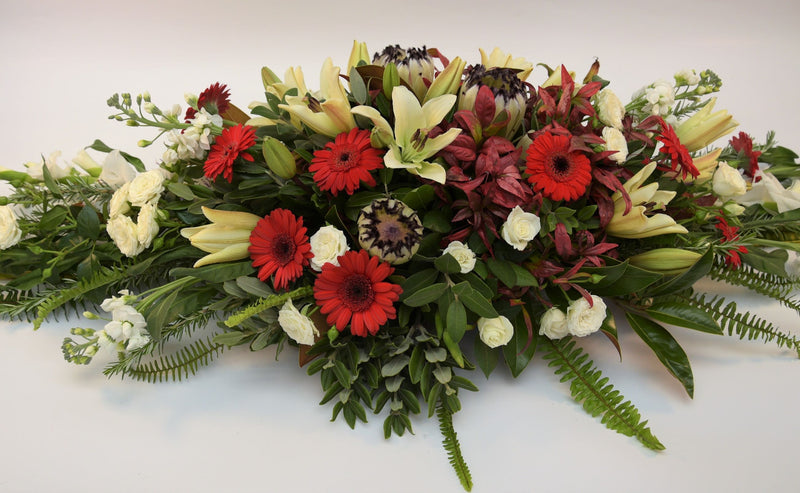 Red Toned Casket Spray