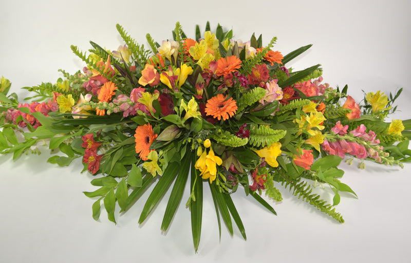 Autumn toned Casket Spray